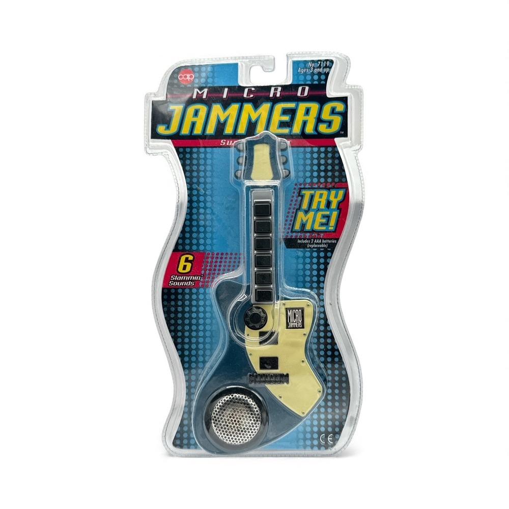 Retro 1997 Unopened, Cap Toys Micro Jammers Surfin Guitar.